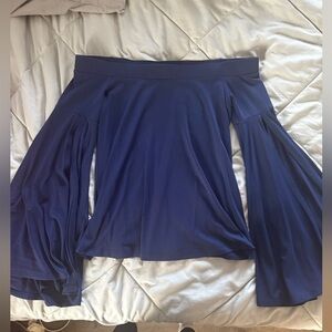 Off the shoulder blue long sleeve shirt.